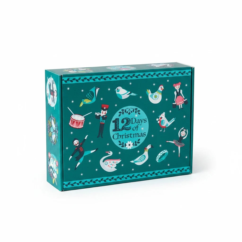 Carmon's Quilt Shop 12 Days of Christmas advent box in dark turquoise with festive character illustrations.