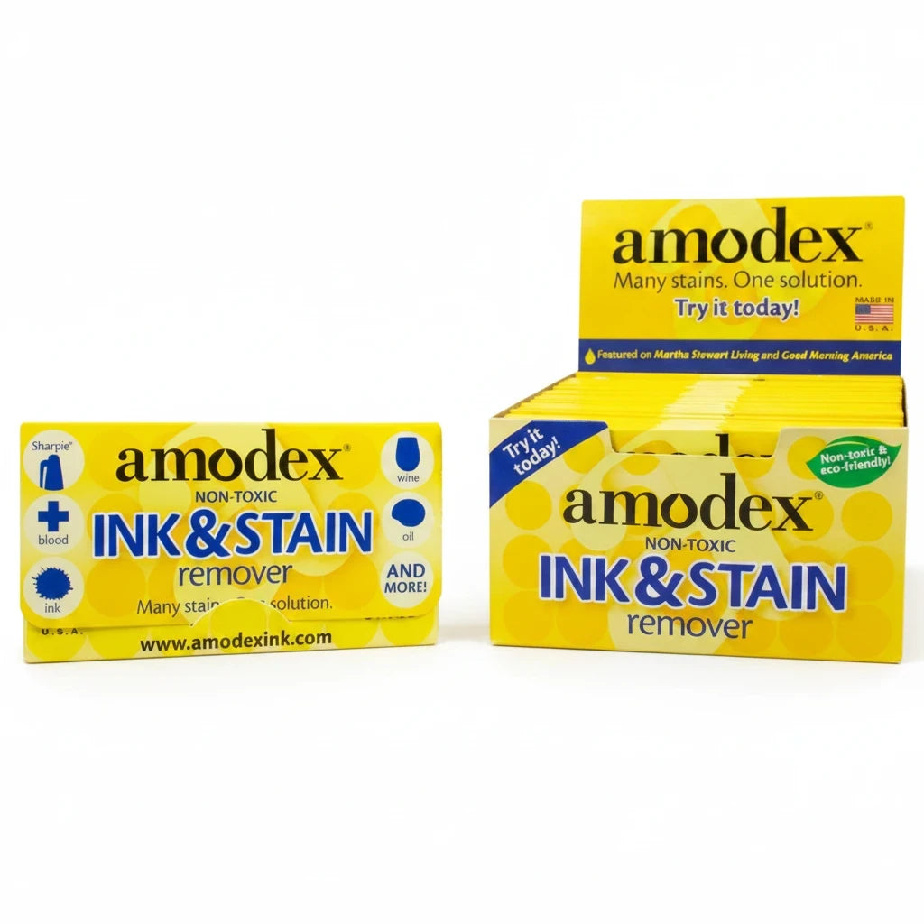 Carmon's Quilt Shop Amodex Ink & Stain Remover trial pack and display box for eco-friendly fabric cleaning