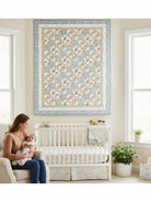 Carmon's Quilt Shop Baby Bears and Airplanes quilt pattern features baby bears in pilot outfits and airplanes on a blue and cream patchwork. Finished size 54" x 70".
