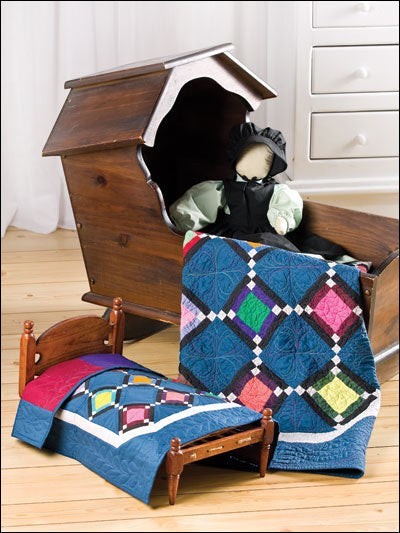 Carmon's Quilt Shop instructional pattern book featuring colorful scrappy baby quilt designs and heirloom projects.