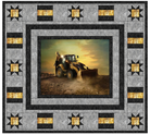 Carmon's Quilt Shop Backhoe Loader quilt kit featuring a construction panel with grey and gold Stonehenge fabrics