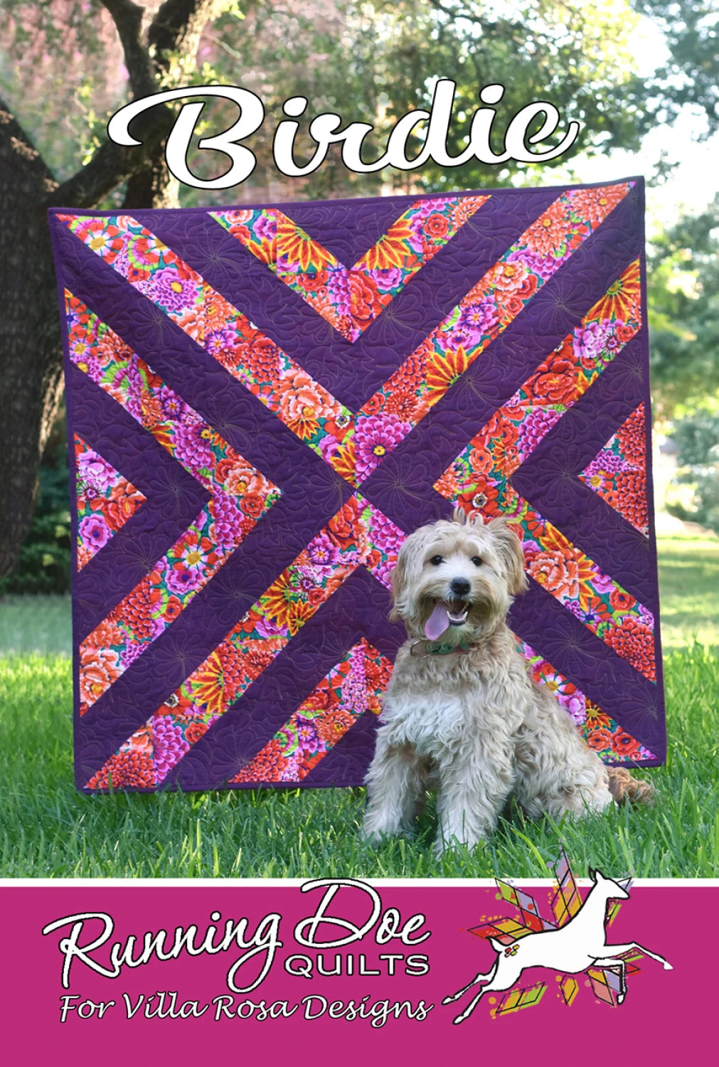 Carmon's Quilt Shop Birdie quilt pattern featuring a purple and floral geometric diagonal design with a small dog