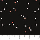 Carmon's Quilt Shop FIGO Fabrics Sweet Treat black cotton quilting fabric with small white and coral star pattern
