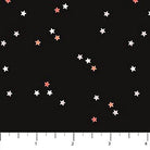 Carmon's Quilt Shop FIGO Fabrics Sweet Treat black cotton quilting fabric with scattered white and peach stars