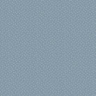 Carmon's Quilt Shop Figo Nest cotton fabric featuring a dusty blue background with a delicate white polka dot pattern.
