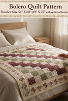 Carmon's Quilt Shop Bolero quilt pattern featuring a patchwork design in burgundy, sage green, and floral cream fabric.