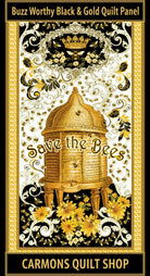 Carmon's Quilt Shop Buzz Worthy fabric panel featuring a gold beehive, bees, and floral motifs in black and gold.