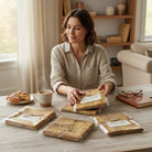 Carmon's Quilt Shop 118-inch wide carmel wood textured abstract cotton fabric folded in clear packaging on a wooden table.