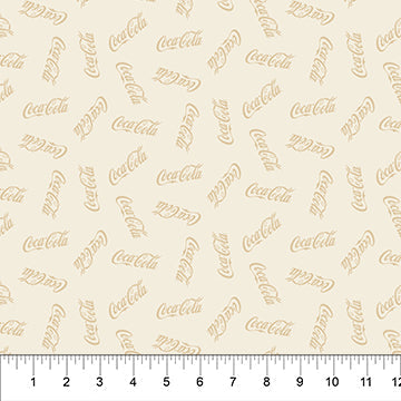 Carmon's Quilt Shop cream fabric featuring a repeating Coca-Cola logo print for holiday quilting projects.