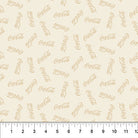 Carmon's Quilt Shop cream fabric featuring a repeating Coca-Cola logo print for holiday quilting projects.