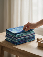 Carmon's Quilt Shop Coral Reef fat quarter bundle featuring blue and teal ocean-themed cotton fabrics for quilting.