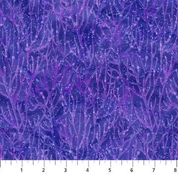 Carmon's Quilt Shop Coral Reef fabric by Northcott featuring purple coral patterns on a dark blue background