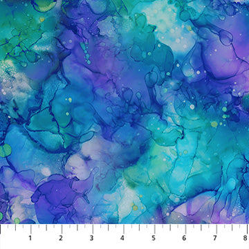 Carmon's Quilt Shop Coral Reef turquoise multi fabric with an abstract alcohol ink design for quilting and sewing.