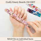 Carmon's Quilt Shop The Gypsy Quilter Crafty Emery Board with sewing themed print being held by a hand