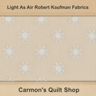 Carmon's Quilt Shop Light As Air cream 100% cotton quilting fabric with a delicate white floral pattern.