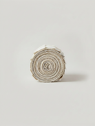 Carmon's Quilt Shop Light As Air 2.5-inch cream cotton fabric jelly roll for quilting and sewing projects.