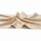 Carmon's Quilt Shop cream 100% cotton quilting fabric with a delicate white floral line art pattern