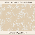 Carmon's Quilt Shop cream 100% cotton quilting fabric with an elegant white airy floral pattern from Robert Kaufman