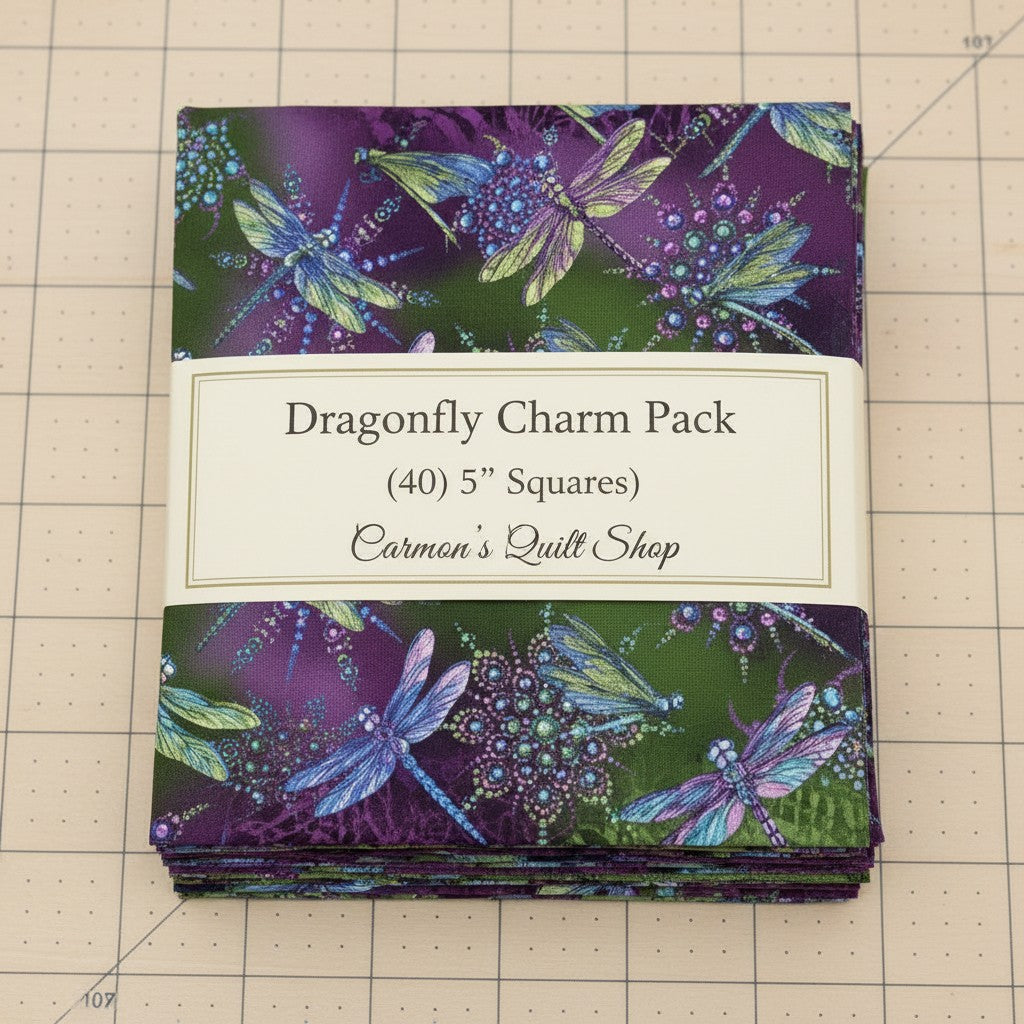 Carmon's Quilt Shop Dragonfly Wonder 5-inch charm pack featuring 40 cotton fabric squares with dragonfly prints.