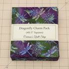Carmon's Quilt Shop Dragonfly Wonder 5-inch charm pack featuring 40 cotton fabric squares with dragonfly prints.