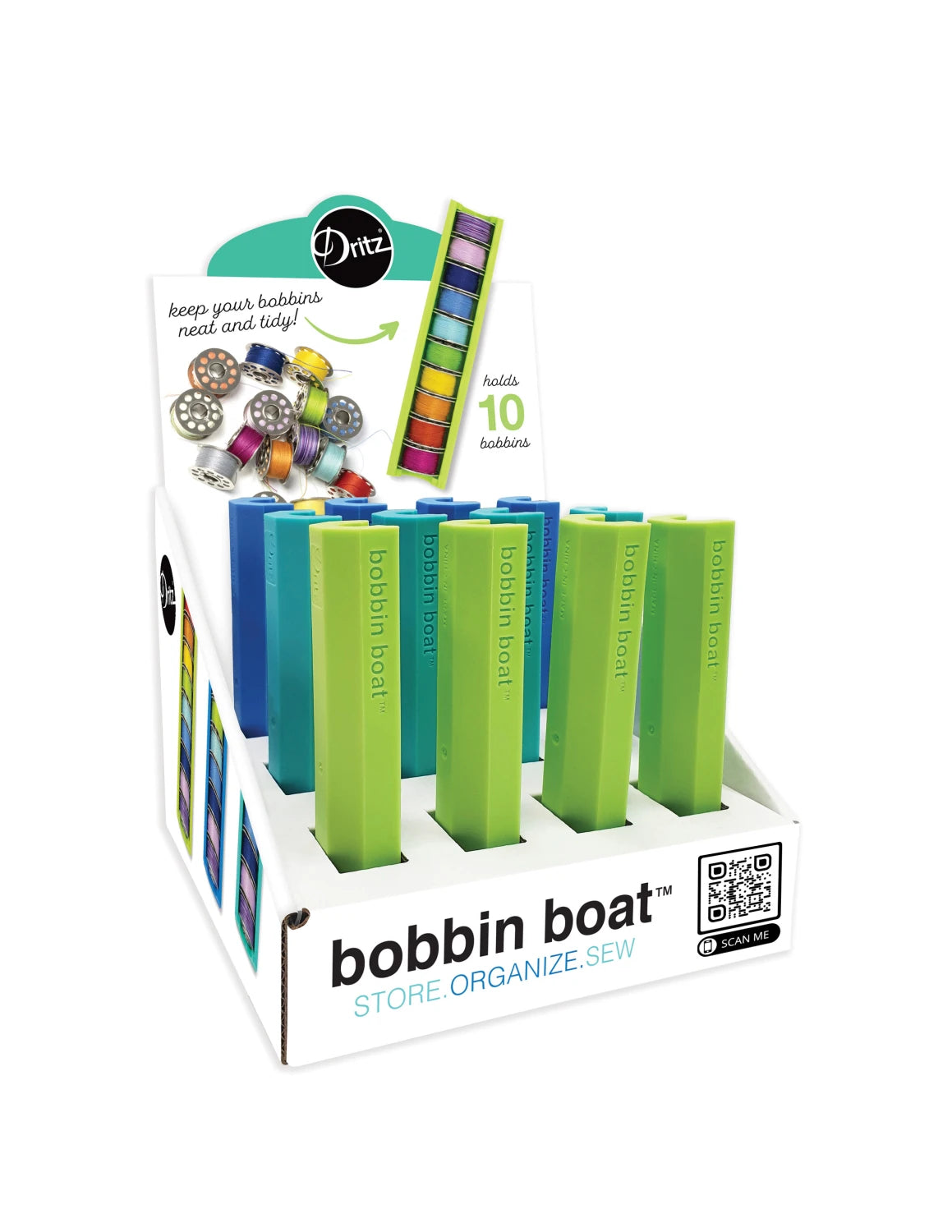 Carmon's Quilt Shop Dritz Bobbin Boat display box filled with green and blue plastic bobbin storage holders