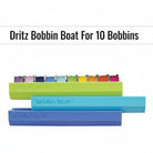Carmon's Quilt Shop Dritz Bobbin Boat organizers in green, blue, and purple holding ten colorful sewing bobbins.