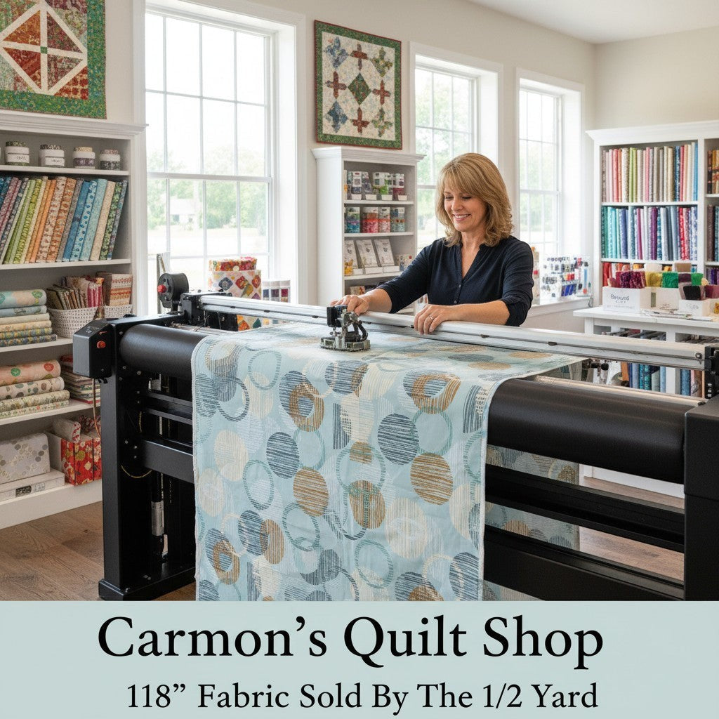 Carmon's Quilt Shop dusty aqua cotton fabric with overlapping circle geo print on a longarm quilting machine