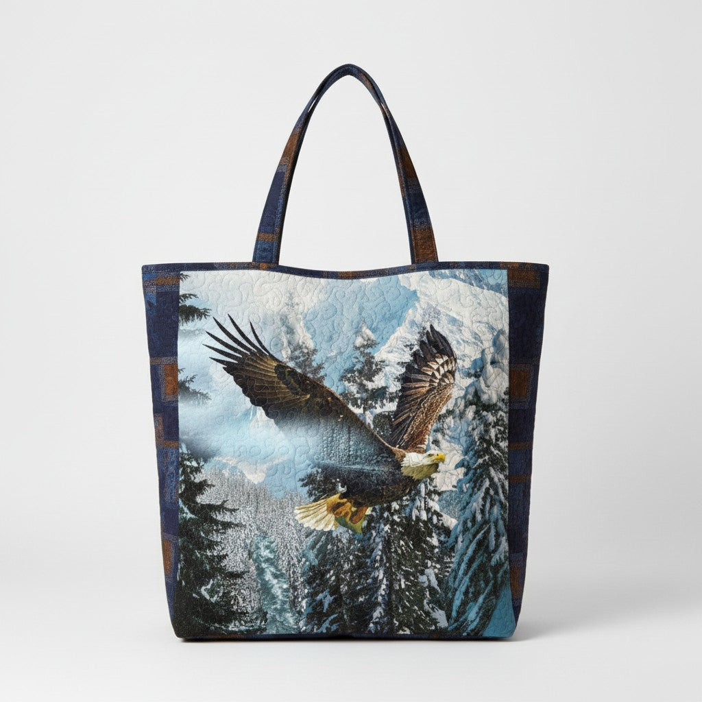 Carmon's Quilt Shop tote bag featuring a Hoffman Fabrics eagle mountain landscape print in blue, white, and brown.
