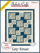 Carmon's Quilt Shop Easy Street quilt pattern by Fabric Cafe featuring a blue and cream floral block design