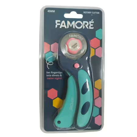 Carmon's Quilt Shop Famore 45mm ergonomic rotary cutter in teal and black packaging for quilting and fabric cutting.