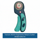 Carmon's Quilt Shop Famore 45mm ergonomic rotary cutter with teal and dark blue non-slip handle for quilting