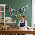 Carmon's Quilt Shop FIFA World Cup 2026 Bunting Kit with colorful pennants and football graphics, 11ft long.