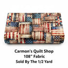 Carmon's Quilt Shop 108 inch wide cotton fabric featuring a rustic red, white, and blue American flag patchwork print.