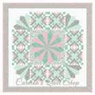 Carmon's Quilt Shop Floating Dresden quilt kit featuring floral Quilting In Bloom cotton fabric in pink and mint