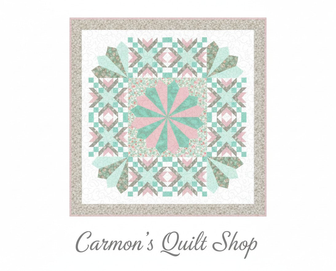 Carmon's Quilt Shop Floating Dresden quilt kit in soft pink, green, and floral cotton prints with a geometric design.