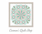 Carmon's Quilt Shop Floating Dresden quilt kit in soft pink, green, and floral cotton prints with a geometric design.