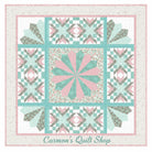 Carmon's Quilt Shop Floating Dresden quilt kit featuring floral Northcott cotton fabrics in pink, teal, and grey.