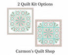 Carmon's Quilt Shop Floating Dresden quilt kit featuring floral Quilting In Bloom cotton fabrics in pink and teal.