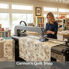 Carmon's Quilt Shop professional using a longarm machine to quilt QT Fabrics Panorama tonal floral cotton backing