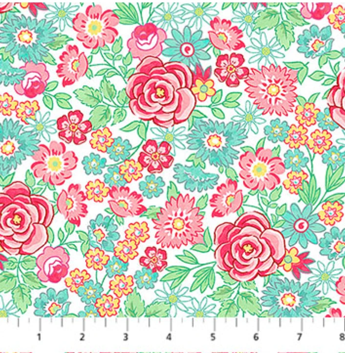 Carmon's Quilt Shop Quilting in Bloom white cotton fabric featuring large pink roses and multi-colored floral print