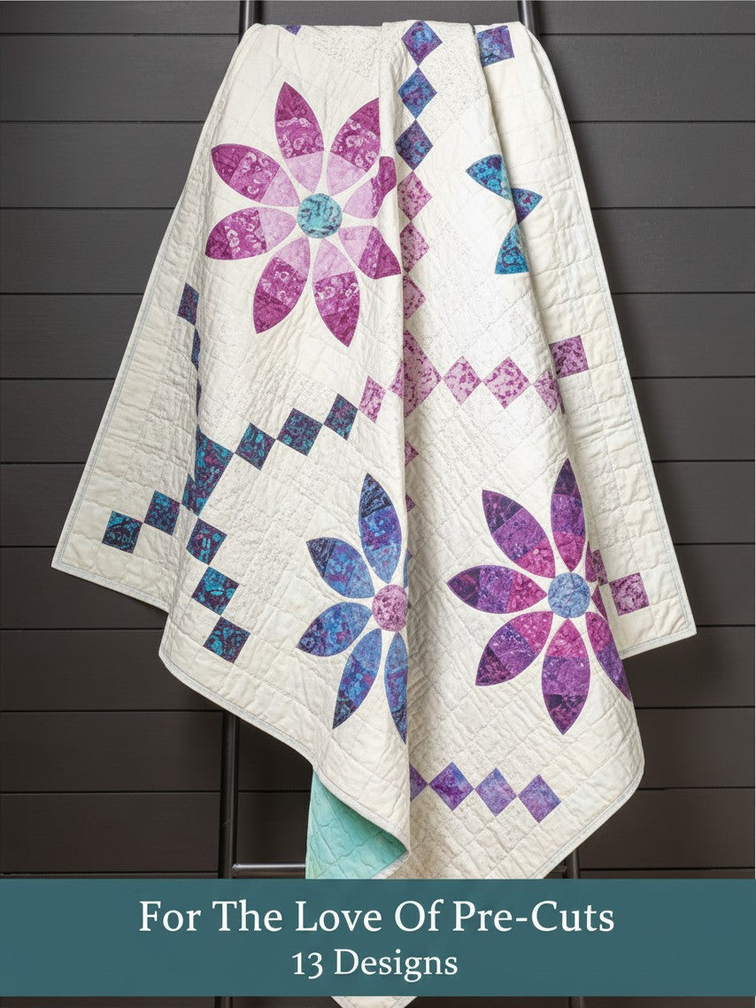 Carmon's Quilt Shop For the Love of Precuts quilt pattern book featuring a floral quilt with purple and blue petals