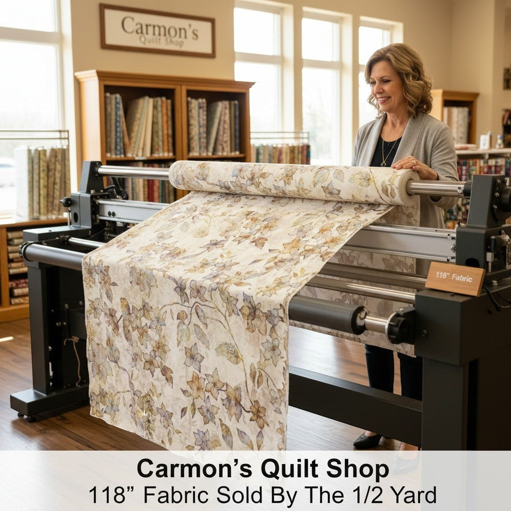 Carmon's Quilt Shop woman using a longarm machine with QT Fabrics Panorama tonal floral 118 inch wide cotton backing