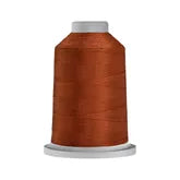 Carmon's Quilt Shop Glide 40wt trilobal polyester thread on a large king spool with a high-sheen copper finish.