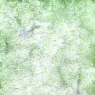 Carmon's Quilt Shop Vintner's Treasure Island Batik fabric in light green with white dotted texture