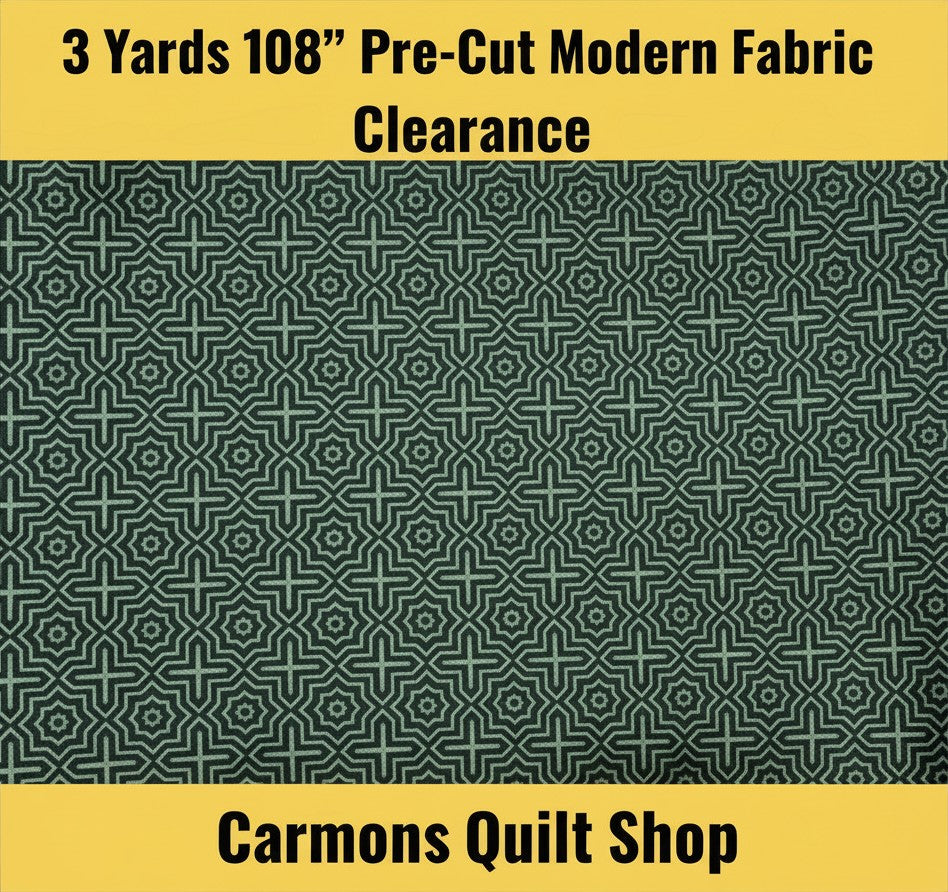 Carmon's Quilt Shop modern green 100% cotton quilt backing fabric with a geometric star pattern in a 3-yard cut.
