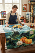Carmon's Quilt Shop Halloween fabric panel with crows, pumpkins, and a moon. 100% cotton, 30" x 43".