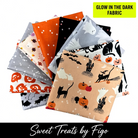 Carmon's Quilt Shop FIGO Fabrics Sweet Treat fat quarter bundle featuring glow in the dark Halloween cotton prints.