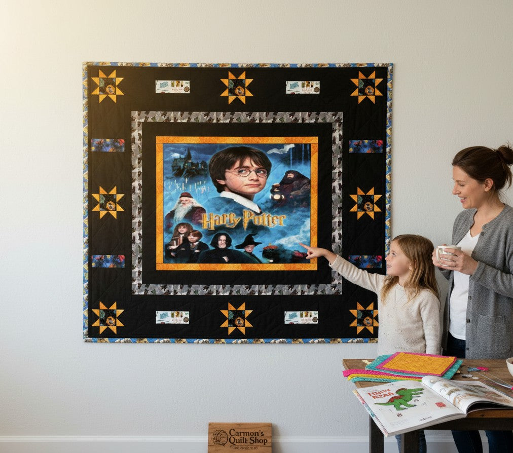 Carmon's Quilt Shop Harry Potter themed quilt pattern featuring characters and Hogwarts castle. Black border with star accents.