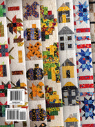 Carmon's Quilt Shop Jelly Roll Quilt Patterns for All Seasons book cover featuring seasonal quilt designs
