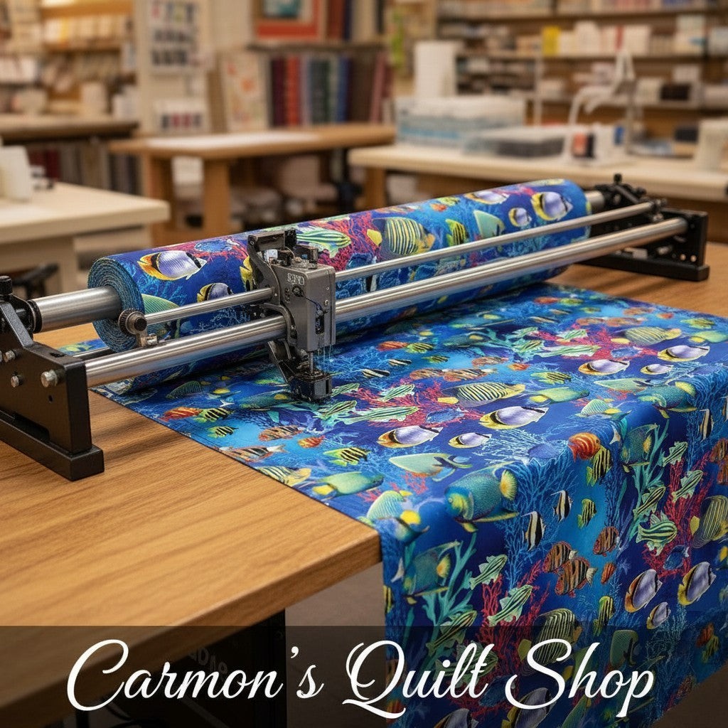 Carmon's Quilt Shop Jewel of the Sea cotton fabric with colorful tropical fish and coral reef print on a quilting machine